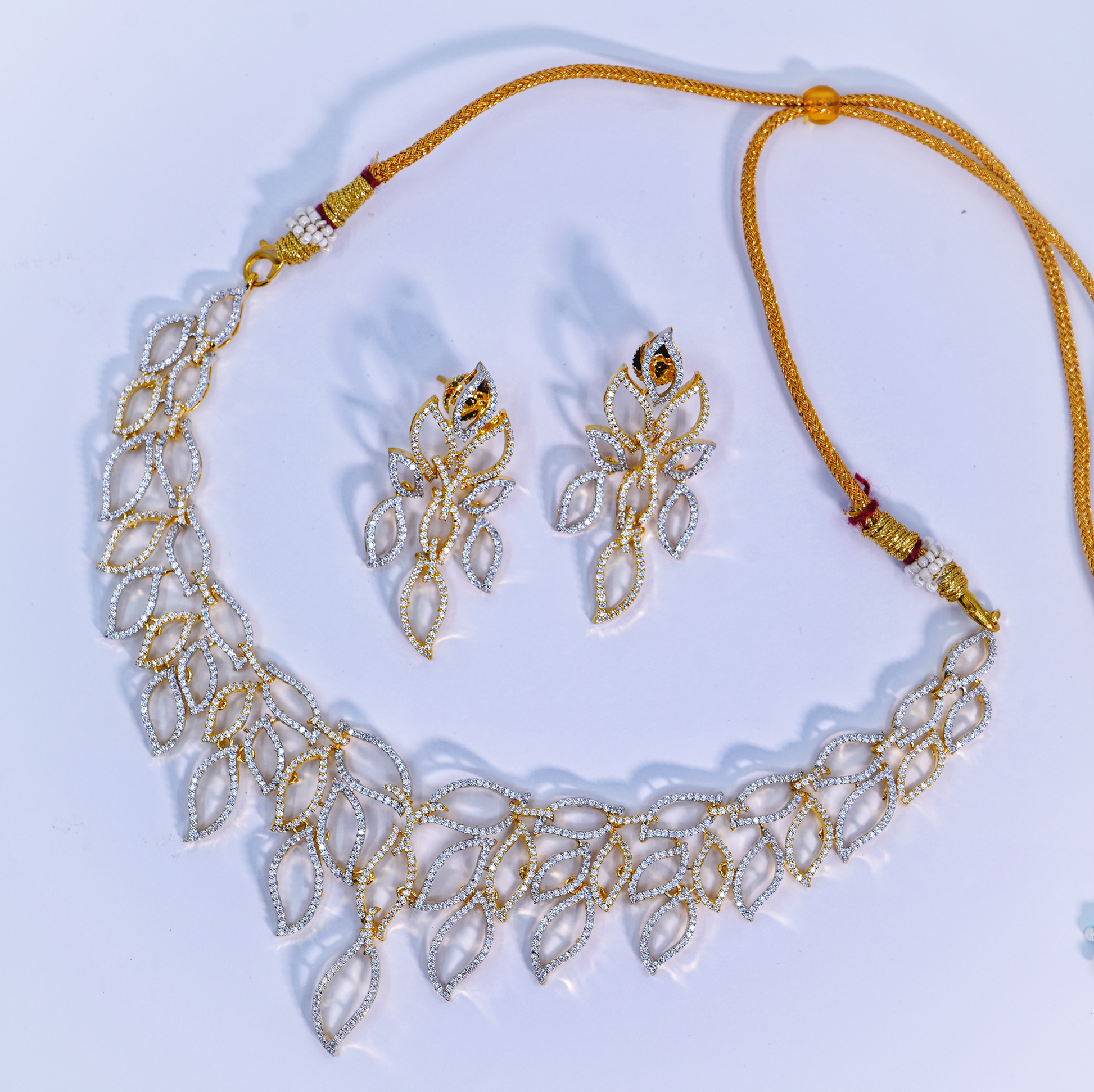 Beautiful CZ Leaves Designer Necklace set - Chaandi Rivaaz